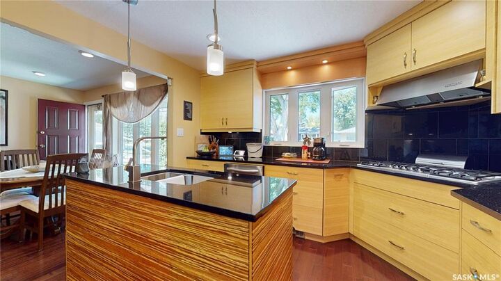 Property Photo:  3307/3309 Dawson Crescent  SK S4R 3V6 