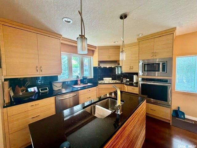 Property Photo: 3307/3309 Dawson Crescent SK S4R 3V6