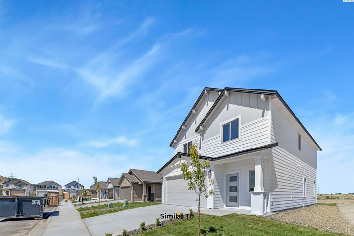 Property Photo:  727 Honeylicious St.  WA 99352 
