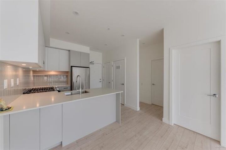Property Photo:  13777 75A Avenue 317  BC V3W 3W4 