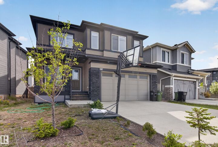 Property Photo: 8607 Mayday Wynd SW AB T6X 2L3