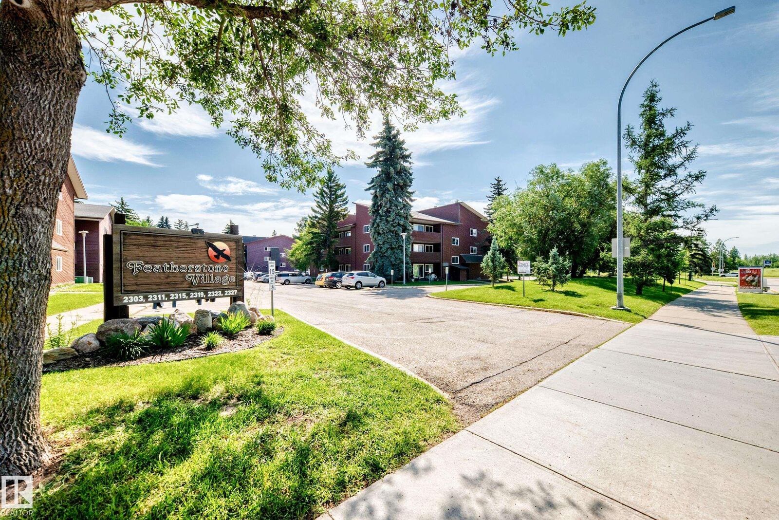 Property Photo: 2303 119 Street NW 104 AB T6J 4E2