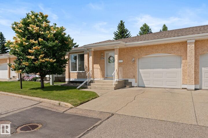 Property Photo: 1234 105 Street NW AB T6J 6J9