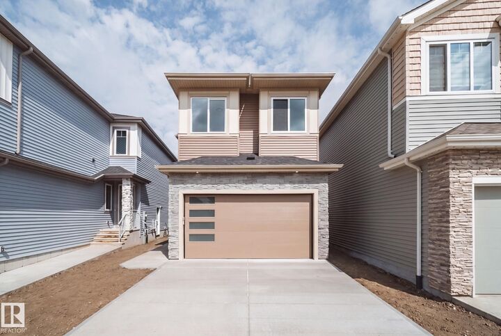 Property Photo:  8816 183 Avenue NW  AB T5Z 0S8 