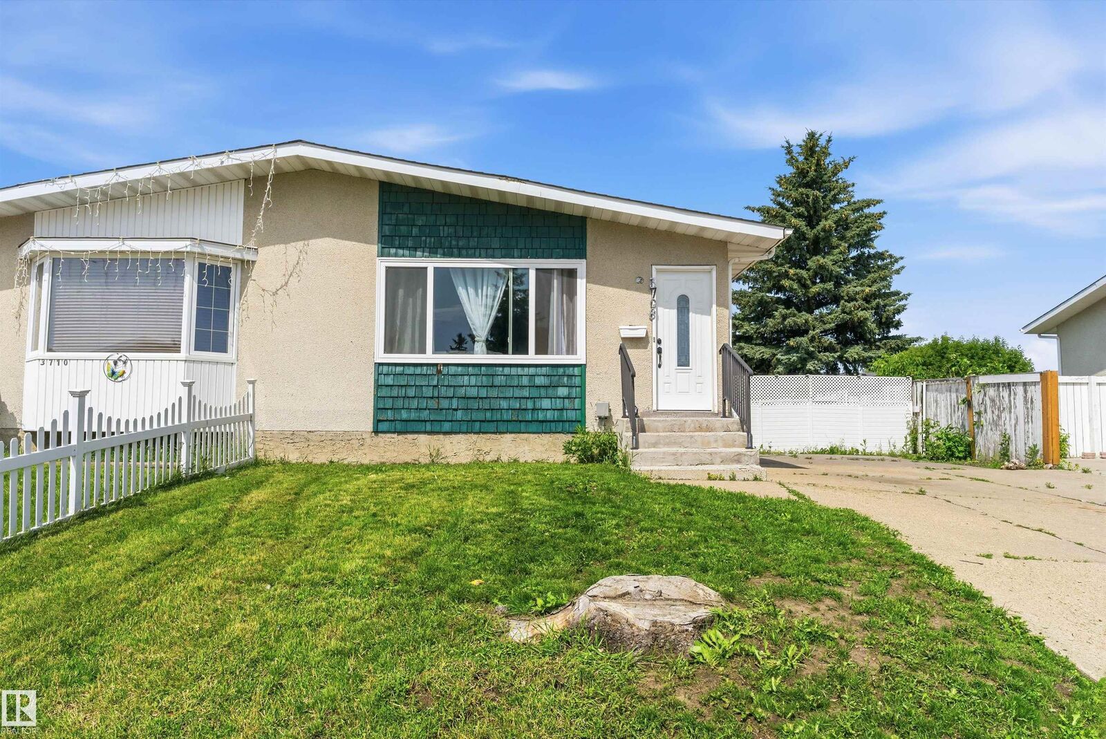 Property Photo:  3708 133 Avenue NW  AB T5A 3E9 