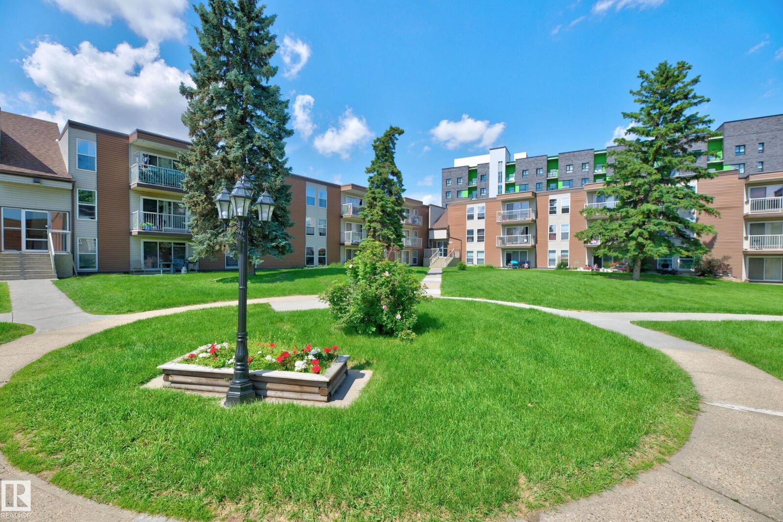 Property Photo: 7220 144 Avenue NW 209 AB T4C 3E4