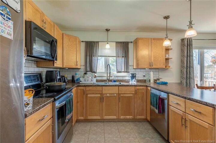 Property Photo: 215 Spruce Street NB E1C 7K5