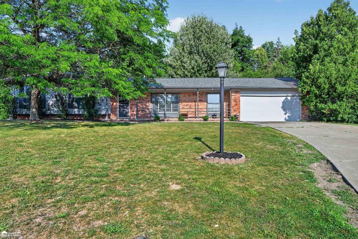 Property Photo:  1392 Wagon Wheel Circle  MI 48439 