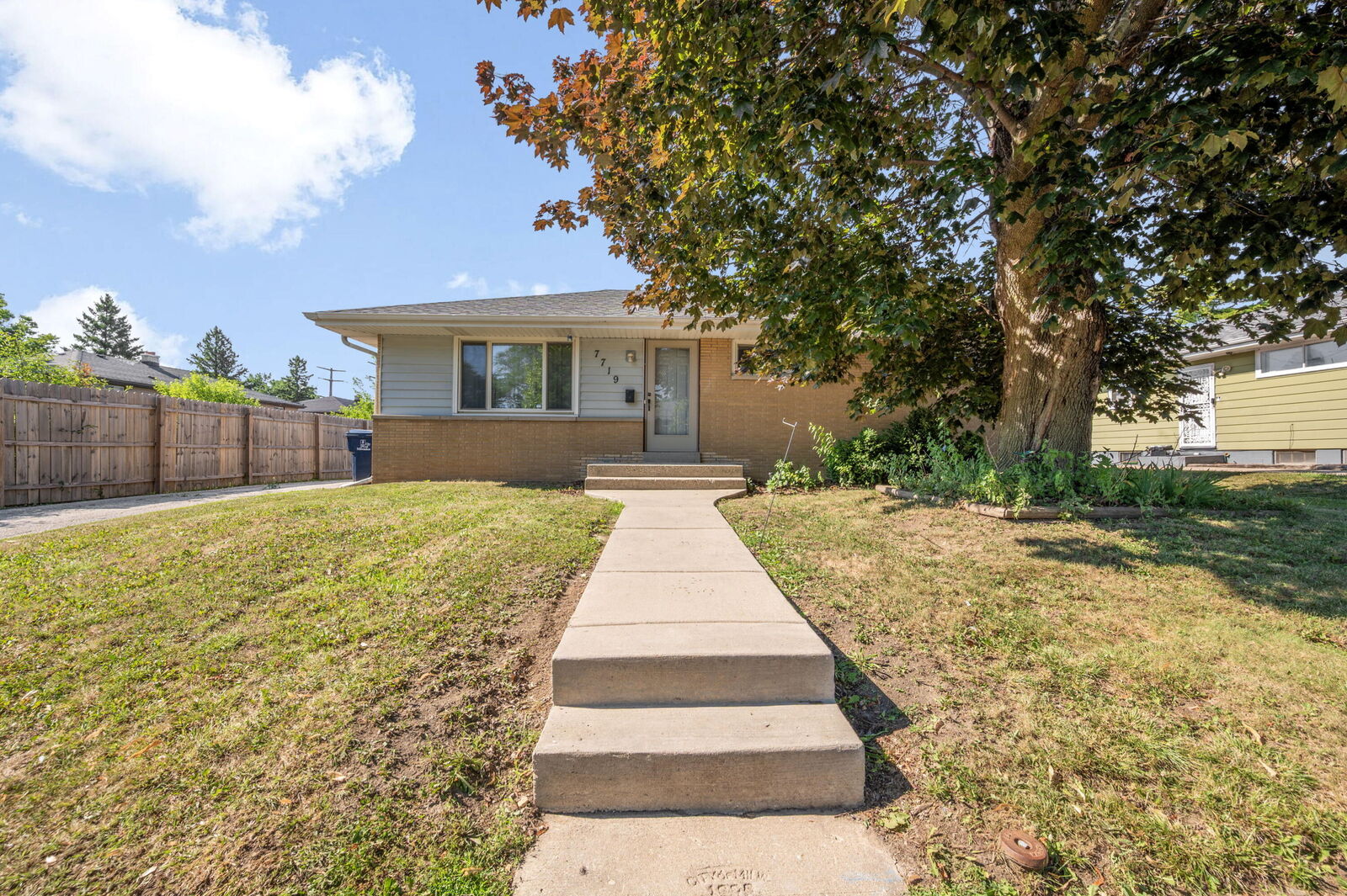 Property Photo:  7719 W Winfield Ave  WI 53218 