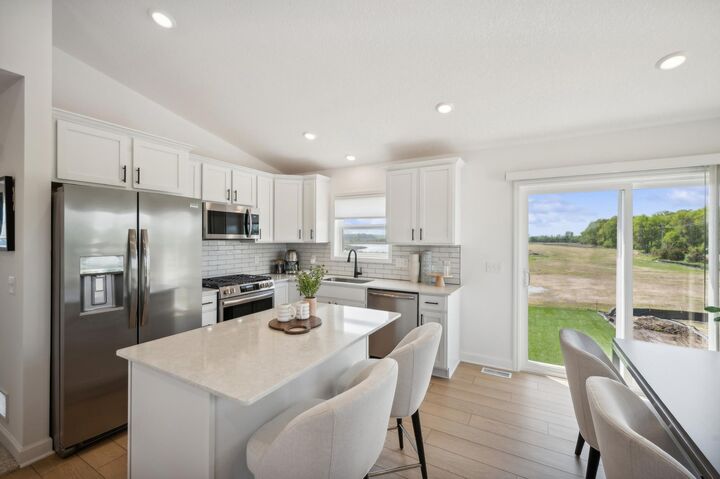 Property Photo: 8560 Farmstead Avenue NE MN 55362