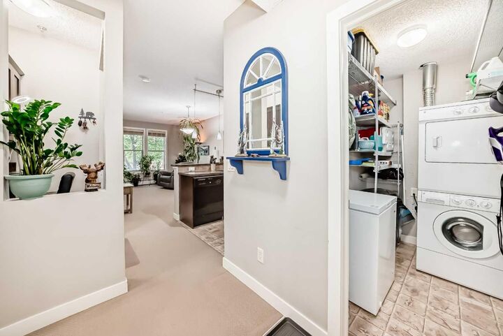 Property Photo: 201 Sunset Drive 113 AB T4C 0H5
