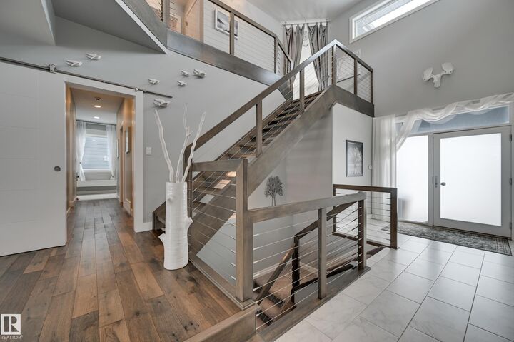 Property Photo: 1311 Hainstock Way SW AB T6W 3B6