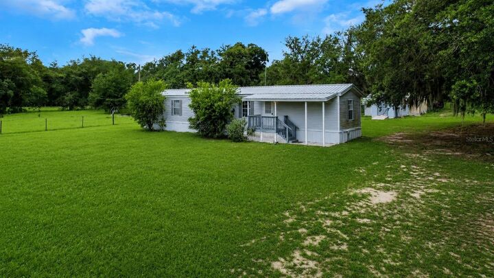 Property Photo:  7438 Cr 663  FL 33513 