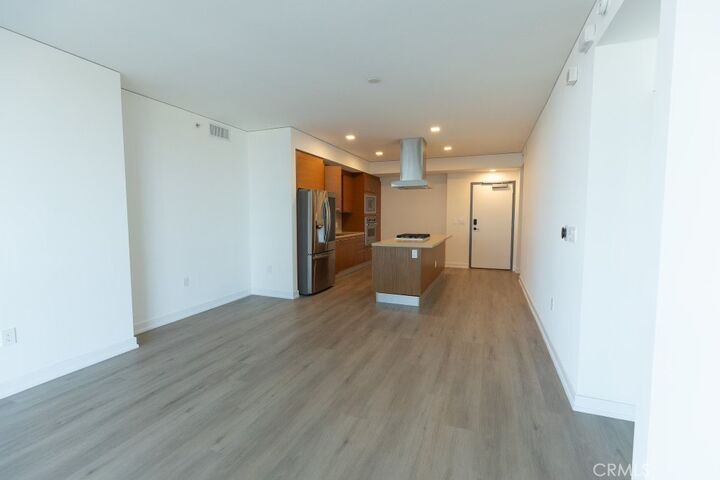 Property Photo:  9 Macarthur 1605  CA 92707 