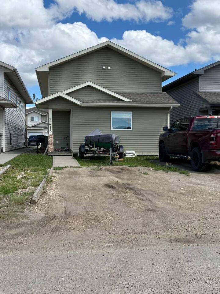 Property Photo: 7418 112 Street AB T8W 0C6