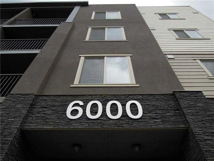 Property Photo:  403 Mackenzie Way SW 6210  AB T4B 3V7 