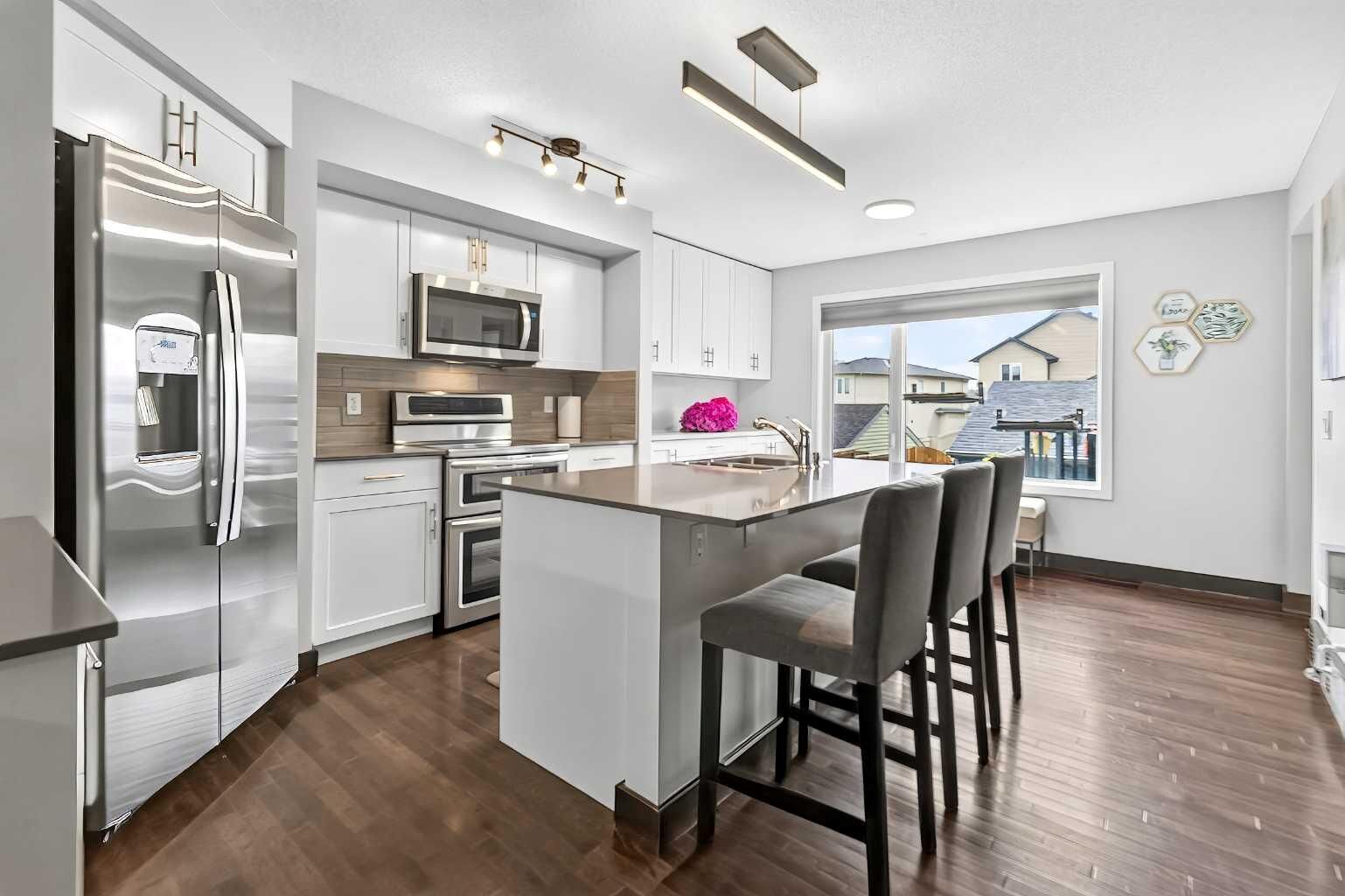 Property Photo: 102 Panatella Hill NW AB T3K 0B6