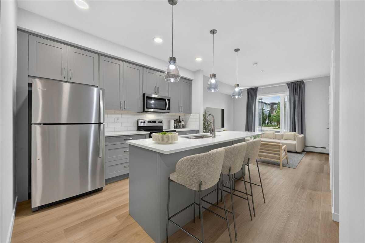 Property Photo: 200 Shawnee Square SW 101 AB T2Y 0T7