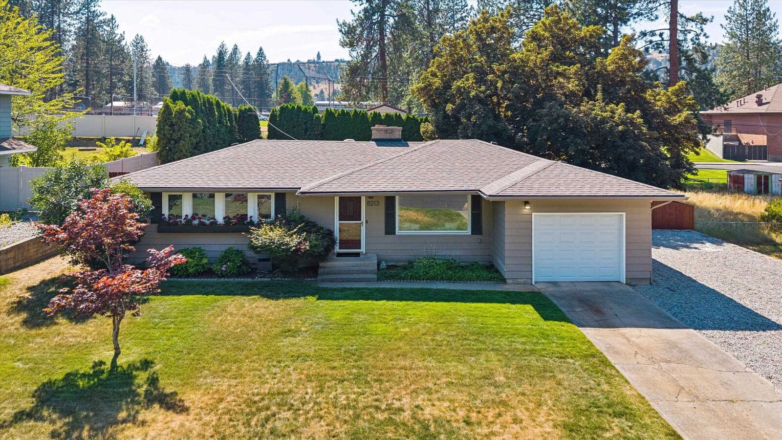 Property Photo:  8213 N Whitehouse Dr  WA 99208 