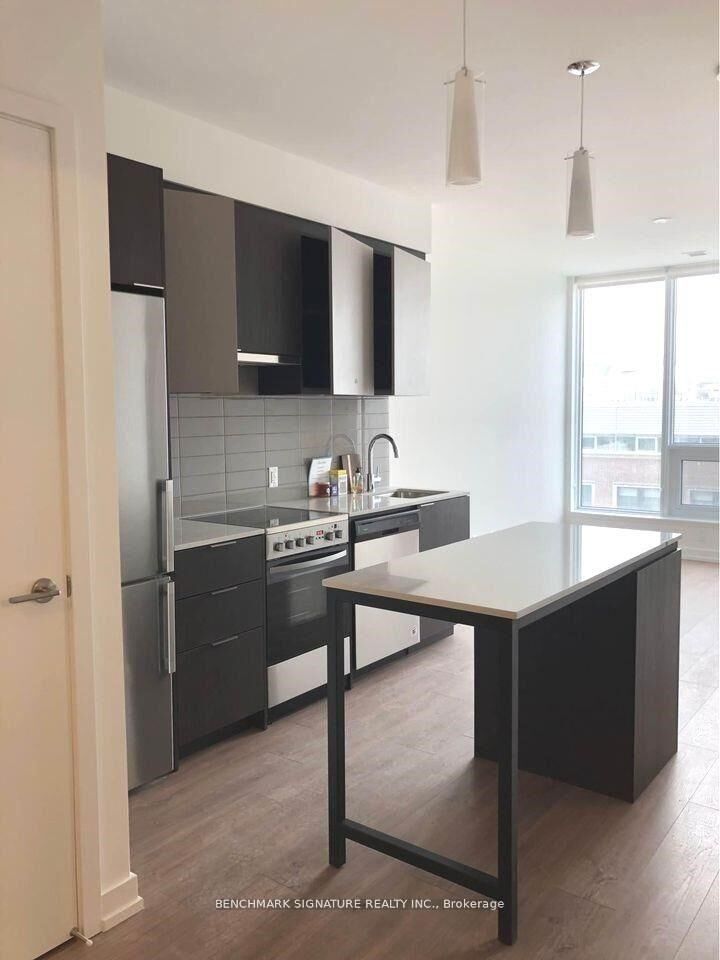 Property Photo: 203 College Street 605 ON M5T 0C8