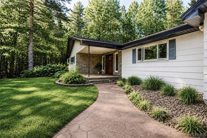 Property Photo:  4137 Chapel Hill Road  NY 14706 