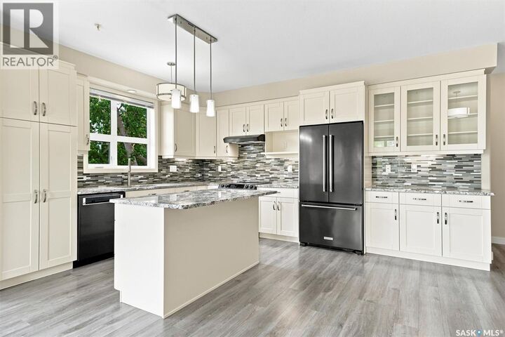 Property Photo:  210 1015 Moss Avenue  SK S7H 4J3 