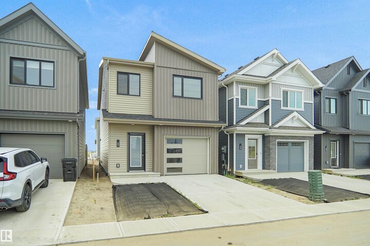 Property Photo: 1430 Aster Way NW 27 AB T6T 2N8