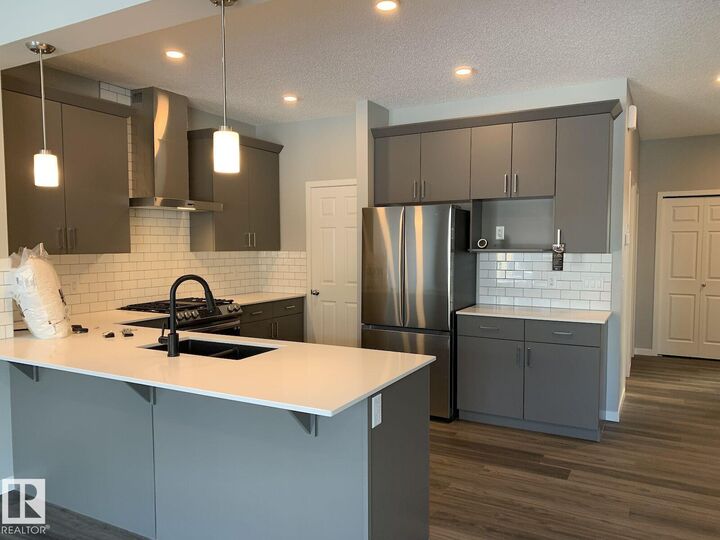 Property Photo:  9871 226 Street NW  AB T5T 7V2 