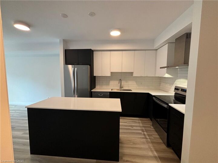 Property Photo:  153 Wilson Street W 105  ON L0R 1C0 