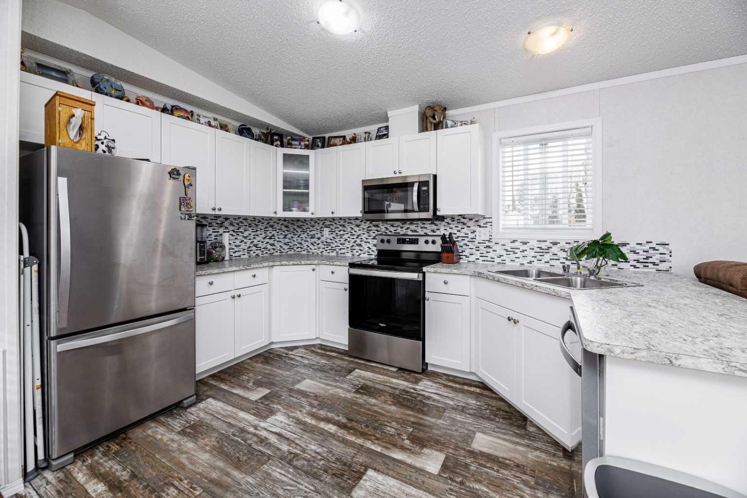 Property Photo:  4922 Womacks Road 65  AB T0M 0J0 