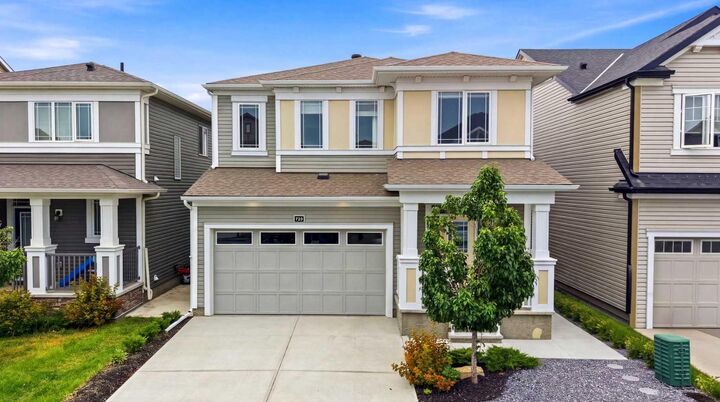 Property Photo: 733 Windrow Manor SW AB T4B 5H6