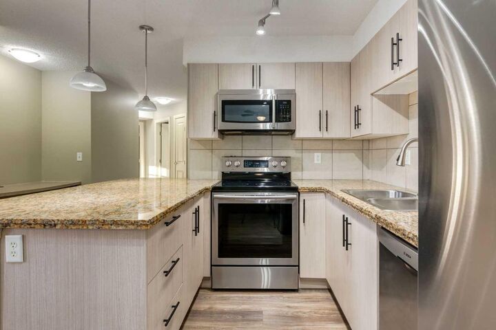 Property Photo:  108 Country Village Circle NE 301  AB T3K 0E3 