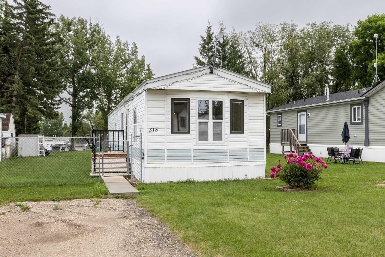 Property Photo: 315 Meadow Drive AB T0M 0H0