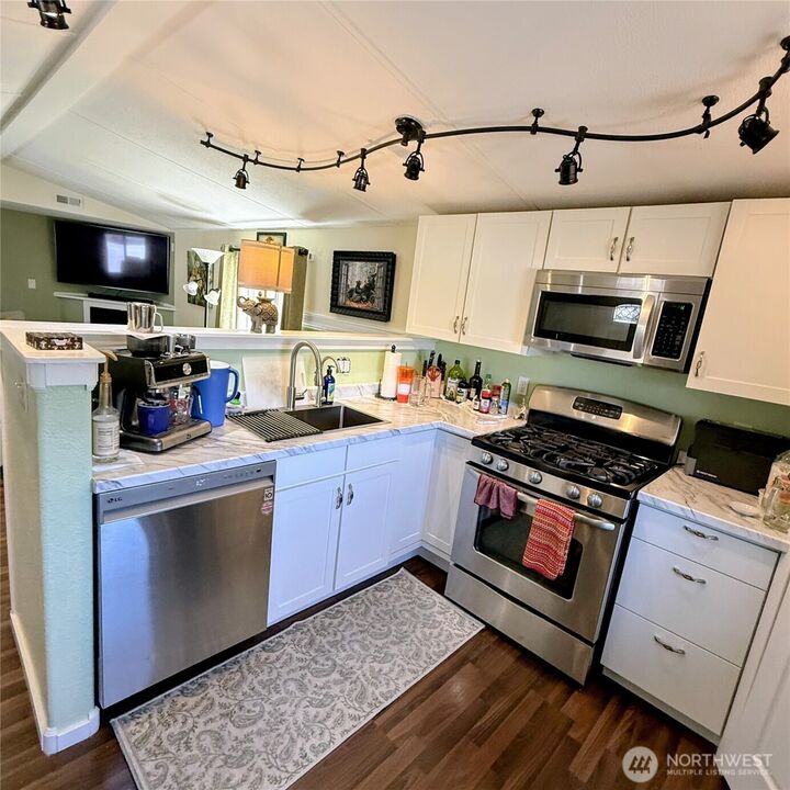 Property Photo:  18501  52nd Avenue W 53  WA 98037 