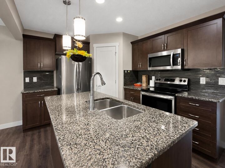 Property Photo: 20312 42 Avenue NW AB T6M 0R8