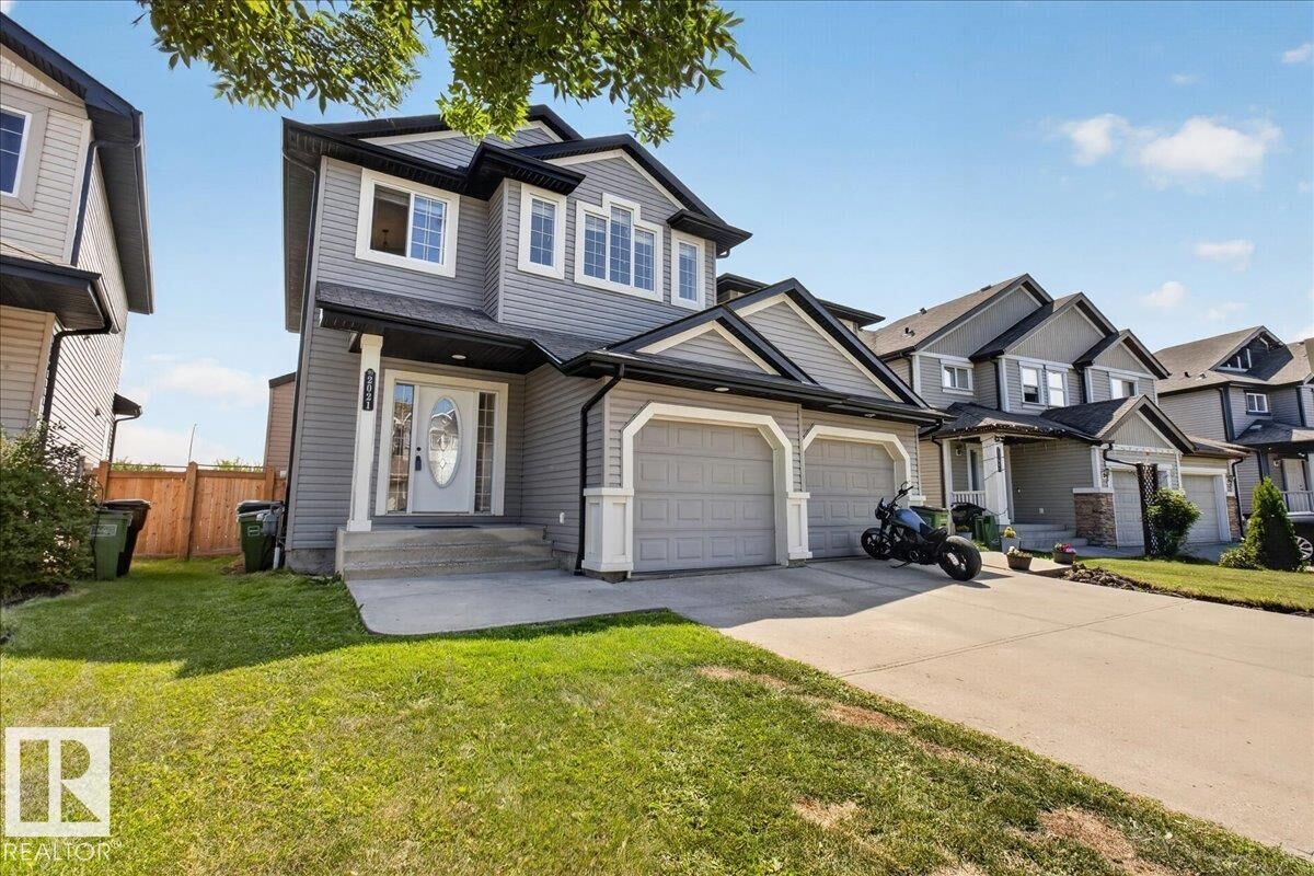 Property Photo: 2021 118 Street SW AB T6W 0E4