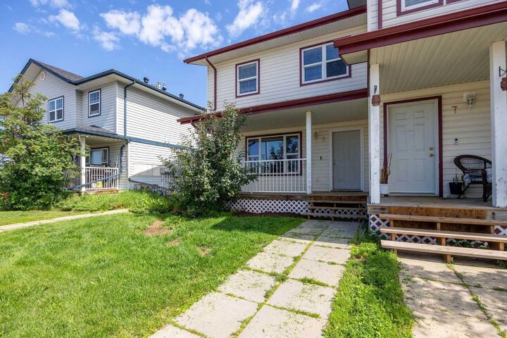 Property Photo: 100 St. Laurent Way 5 AB T9K 2R4