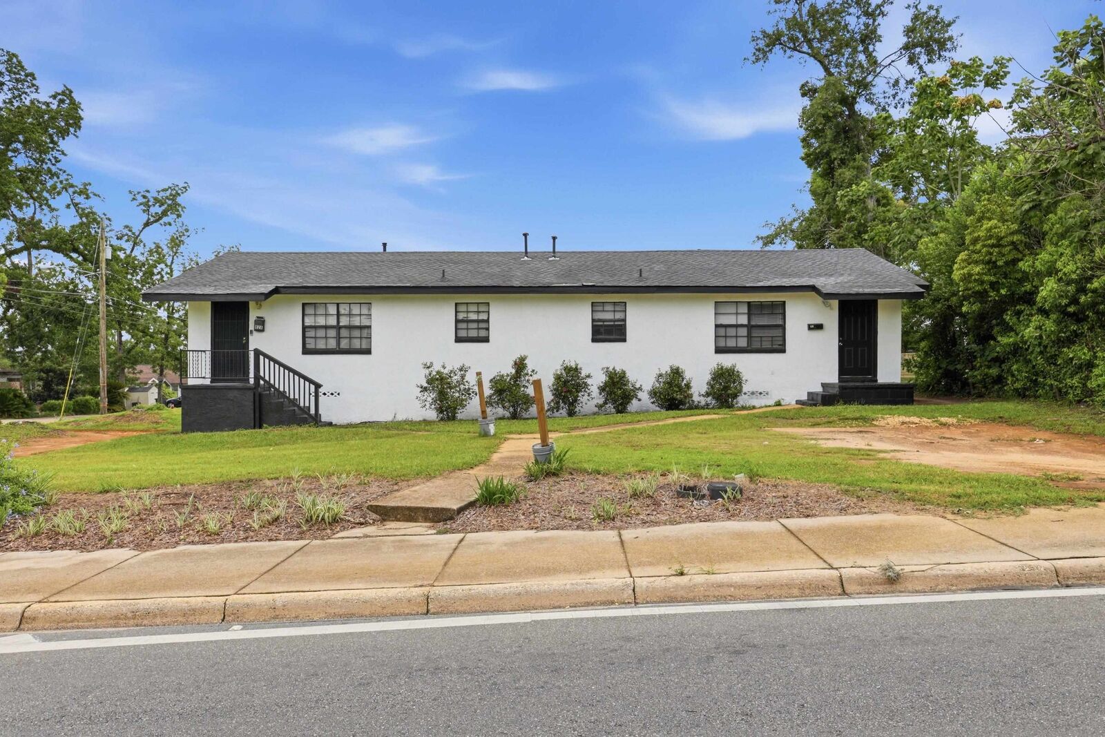 Property Photo: 826 Robert And Trudie Perkins Way 1&2 FL 32310