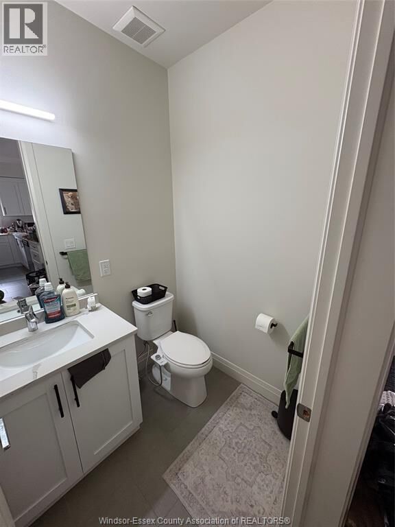 Property Photo:  233 Watson 106  ON N8S 3R8 
