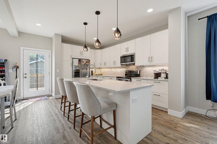 Property Photo: 12219 93 Street NW AB T5G 1G2