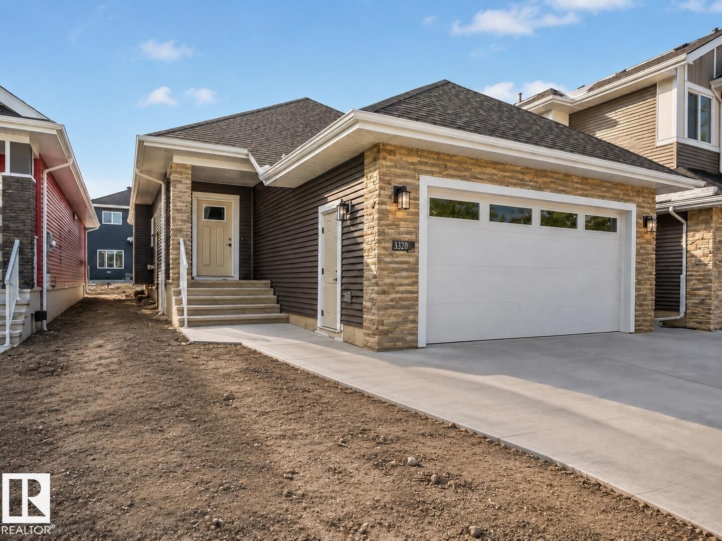 Property Photo: 3320 Chickadee Drive NW AB T5S 0V4