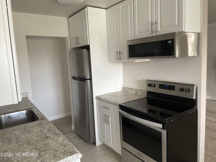 Property Photo:  60 Manchester Court  NJ 07728 