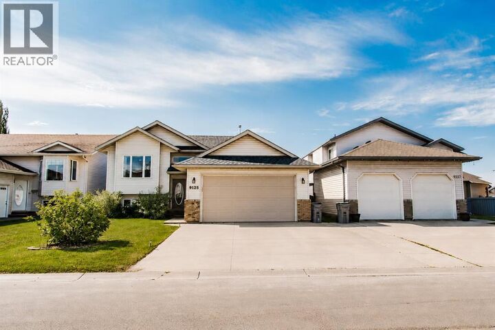 Property Photo: 9125 129 Avenue AB T8X 1R5