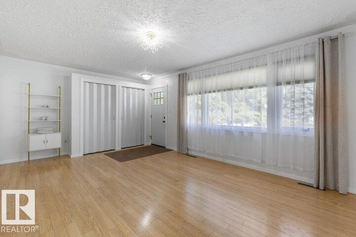 Property Photo:  2 Mill Drive  AB T8N 1J6 