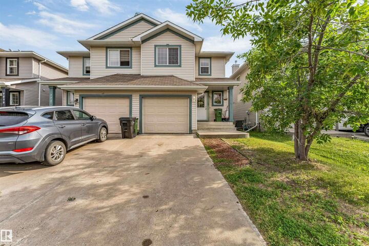 Property Photo:  7743 8 Avenue SW  AB T6X 0A3 