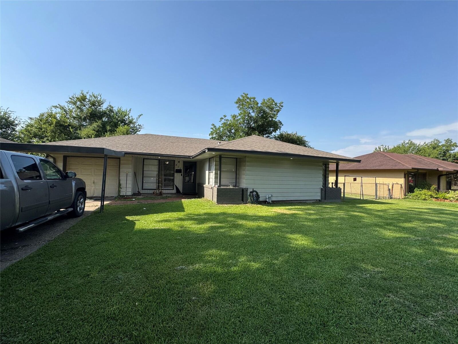 Property Photo:  311 Alta Vista Drive  TX 77502 