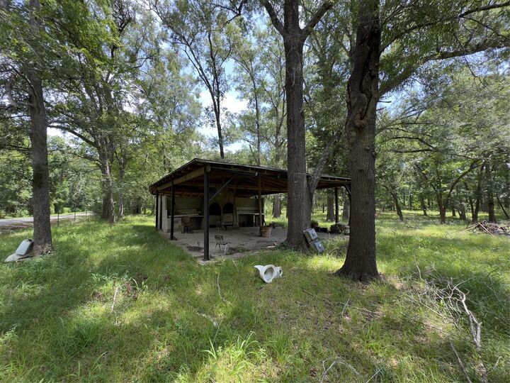 Property Photo: 947 County Road 2850 TX 77327