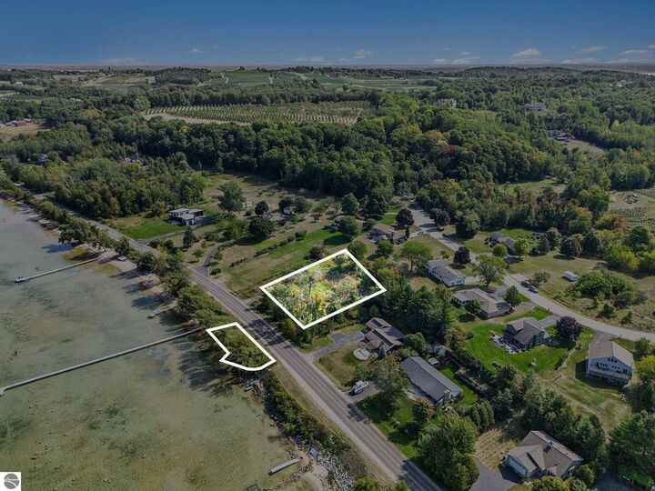 Property Photo:  12016 Peninsula Drive  MI 49686 