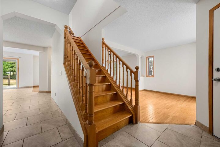 Property Photo:  115 Macewan Park Circle  AB T3K 4A3 