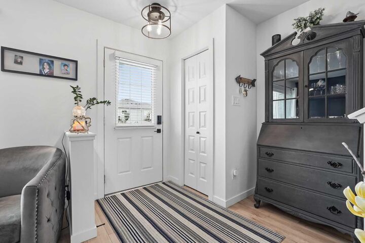 Property Photo: 210 Firelight Way W 1402 AB T1J 5T3